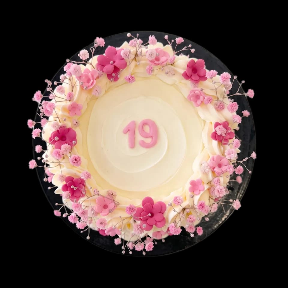 Custom birthday cake with pink sugar flowers by Cakes By Vjollca, Pristina