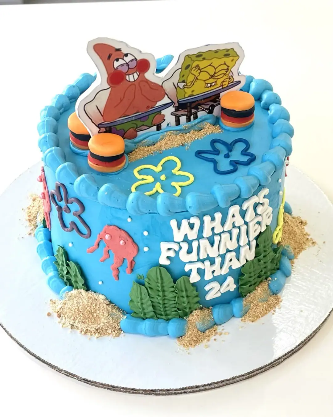 SpongeBob birthday cake with sandy shore, jellyfish and flowers, a custom cake by Cakes By Vjollca in Pristina, Kosovo
