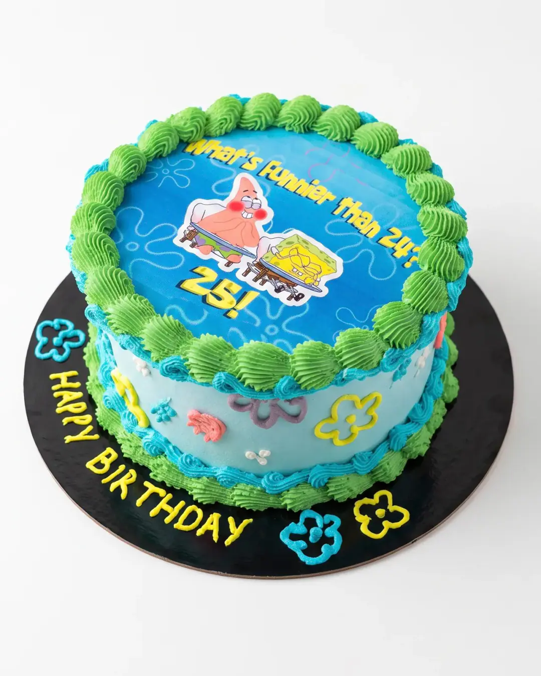 Light blue SpongeBob birthday cake with a printed SpongeBob and Patrick topper, green shell piping and flower outlines, a custom cake by Cakes By Vjollca in Pristina, Kosovo