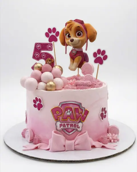 Pink Skye Paw Patrol birthday cake with paw prints and bubbles, a custom cake by Cakes By Vjollca in Pristina, Kosovo